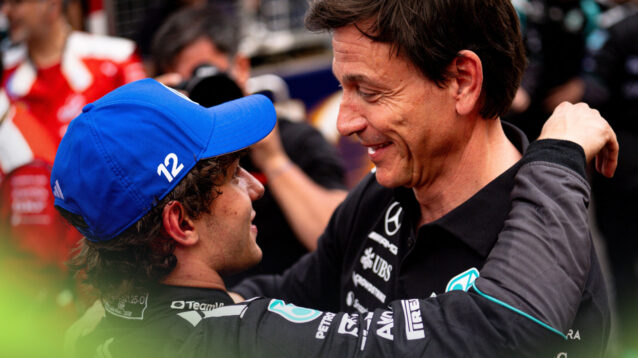 Toto Wolff and Kimi Antonelli embrace following the 2026 Monaco Grand Prix.