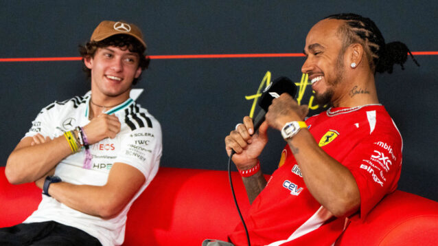Kimi Antonelli and Lewis Hamilton laughing in a press conference