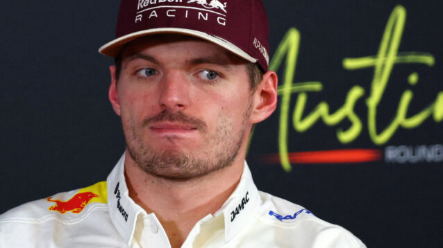 Max Verstappen pulls a face during a press conference