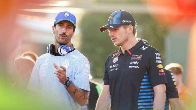 Red Bull's Max Verstappen talking with Racing Bulls' Daniel Ricciardo at his final F1 race at Singapore 2024.